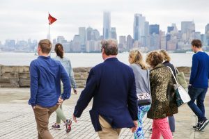 tour group at the statue of liberty
