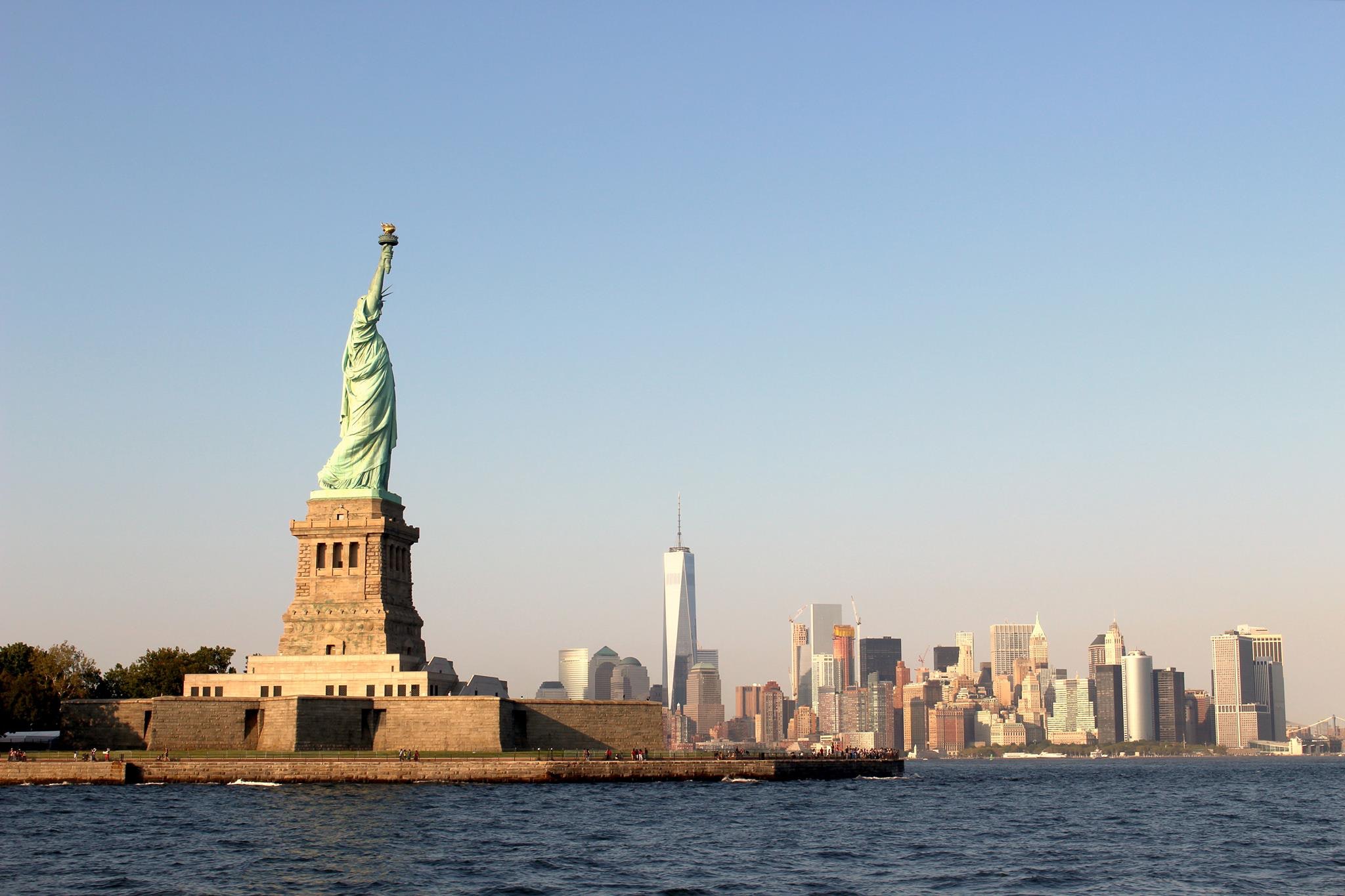 statue of liberty, new york skyline view